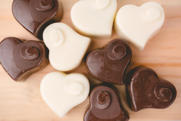 Heart chocolate on wood