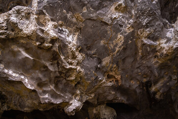 Beautiful texture of dark stone background in the cave