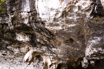 Big dark stone cave inside near entrance