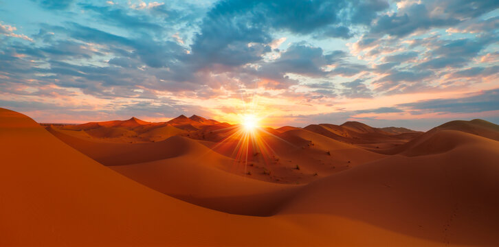 Sand dunes in the Sahara Desert, Merzouga, Morocco - Orange dunes in the desert of Morocco - Sahara desert, Morocco