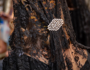 Woman with black mantilla and jewellry at Corpus Christi festial at Toledo, Castilla La Mancha, Spain