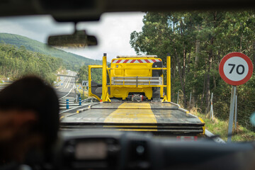 Tow truck for motor homes seen from inside the vehicle, roadside assistance