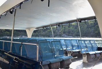 ruise ship with passenger seats. Trip on the lake