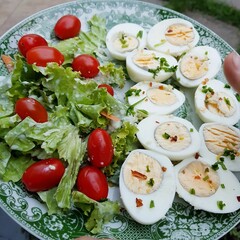 Colorfull low carbohydrate meal with boiled eggs and fresh salad for healthy life. Paleo food. Simple lowcarb meal.