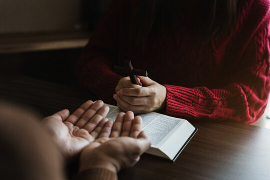 woman hands praying to god with the bible. Woman Pray for god blessing. Religious beliefs Christian life crisis prayer to god.