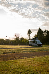landscape with a motor home at dawn in a camping