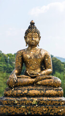 Buddha statue. The peace of the Buddha. Statue of Buddha sitting in meditation