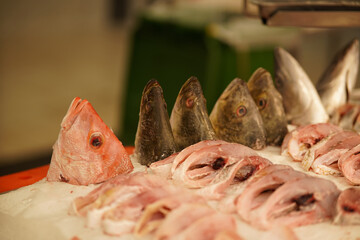 Tuna fish fillet and head at the fish market
