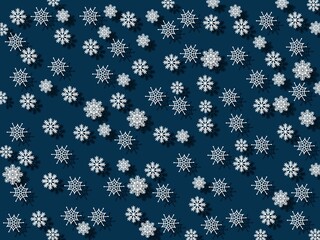 Falling white snowflakes on a blue background. New year and christmas concept.