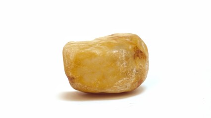 yellow marble on a white background
