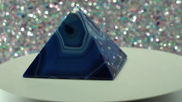 Agate as a blue pyramid as a gem stone