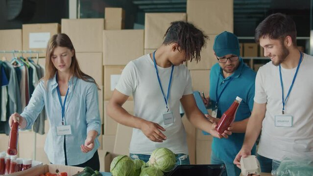 The Concept of Social Aid. Group of Volunteers Preparing Free Food Rations for Poor People in Need. Charity Workers and Members of the Community Work Together. Concept of Giving, Humanitarian Aid.