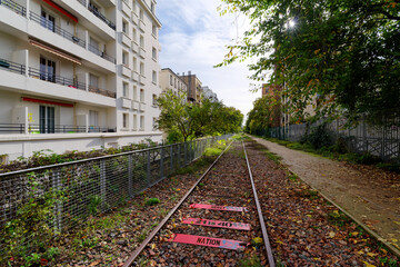 Railway track  of  the Petite Ceinture Paris' Abandoned Railway in 12th arrondissement - obrazy, fototapety, plakaty