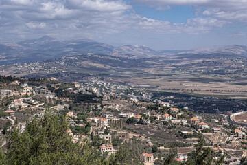 Fototapeta na wymiar Southern Lebanon villages and agricultular fields as seen from kibbutz Misgav Am, located on the Isreali-Lebanses border, near Kiryat Shmona in Northern Israel, Israel.