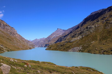 Fototapeta na wymiar Mauvoisin reservoir located in Val de Bagnes, Valais with concrete arch dam, Switzerland