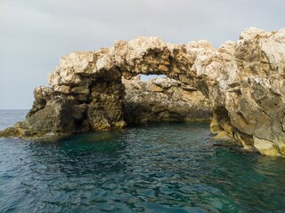 Beautiful shot of stone formations over the water at the Tremiti Islands in Puglia, Italy