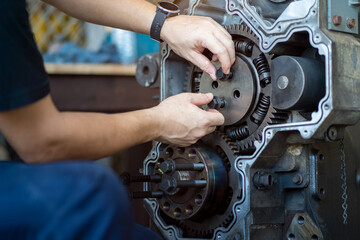 closedup of Diesel commonrail engine in heavy machinery workshop