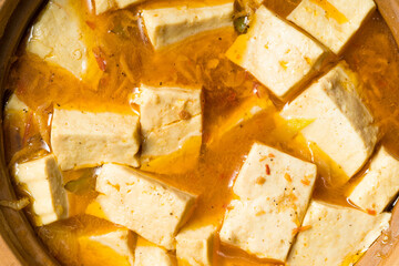 Dry roasted tofu pot on sackcloth