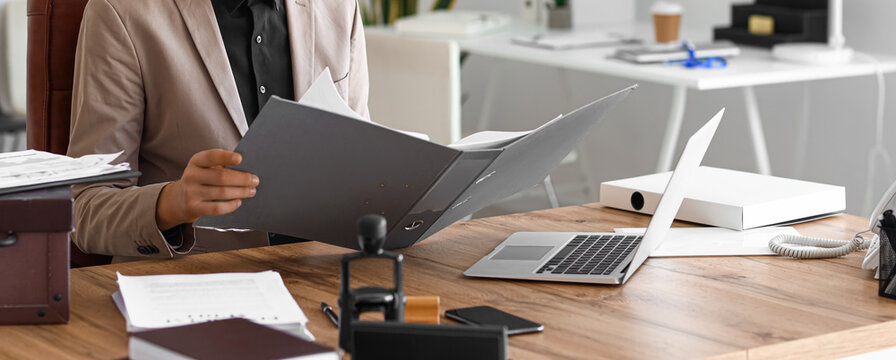 Young Male Lawyer Working In Office