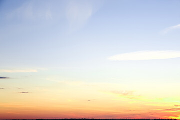 Naklejka na ściany i meble View of beautiful evening sky at sunset