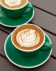 A cup of hot art latte, cappuccino 