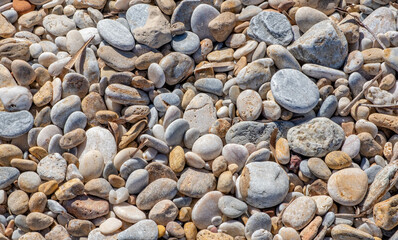 Pebbles on a beach at Kamares on Sifnos island in Greece