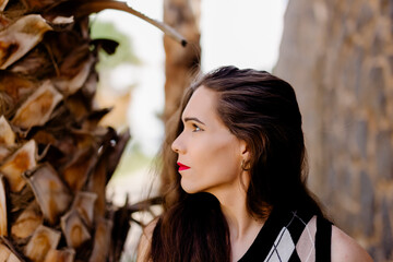 Confident young transgender woman looking at camera while posing