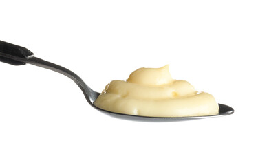 Spoon with tasty vanilla pudding isolated on white background, closeup