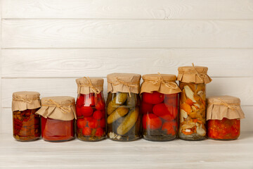Jars of pickled vegetables. Marinated food.Assortment of homemade jars with a variety of marinated...