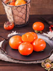 The fresh fruit of autumn, red persimmon