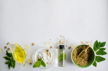 Alternative medicine, herbal extract: oil, white essence, stirring. Dry medicinal herbs, pills