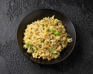 Creamy Garlic and parmesan orzo pasta with lemon zest and parsley