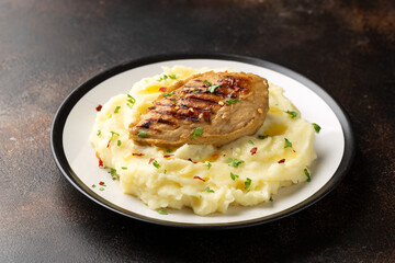Vegan vegetarian Plant based chicken breast served with mashed potato