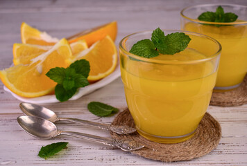 Orange dessert (English citrus cream) in glasses.
