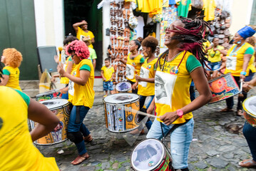  Members of percussion band Dida are seen during performance at Pelourinho. - obrazy, fototapety, plakaty
