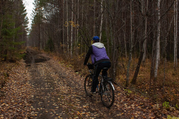 Cycling through the autumn forest. October 2022