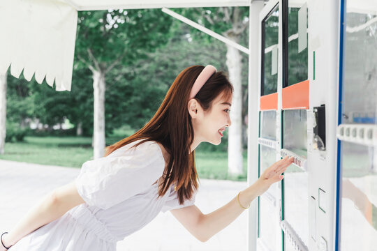 Pretty Girl At The Vending Machine