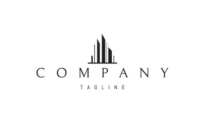 Vector logo on which an abstract image of a modern, developed metropolis with. tall skyscrapers.