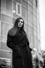 Girl in a coat black and white photo