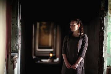 A girl with old books in the old house