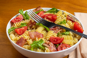 blt pasta  salad with rotini , tomatoe, bacon , and lettuce