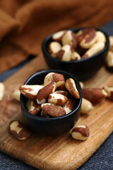 Macro. Large brazil nuts in a bowl. Peeled nuts.