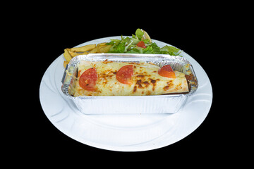 Lasagne meal with french fries, rice and salad