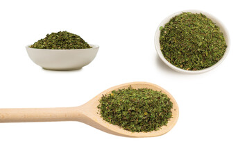Dry mint in wooden spoon isolated on white.