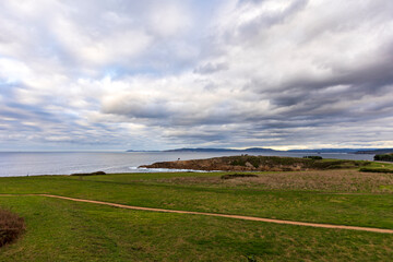 landscape travel through galicia spain with a cloudy sky