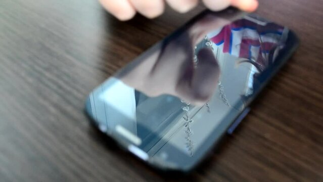 The smartphone in hands. The smartphone in work