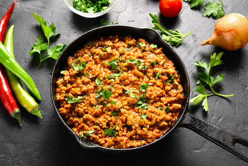 Keema curry in cast iron pan