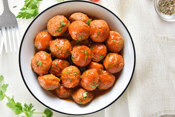 Meatballs with tomato sauce in bowl