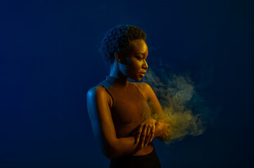 Passion woman blowing smoke curls