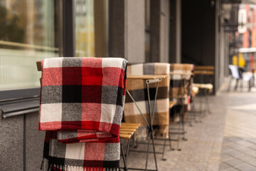 Fototapeta na wymiar Coffee table terrace with blanket